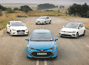 Clockwise from the front: Toyota Corolla, Mazda 3, Renault Megane and Volkswagen Golf.