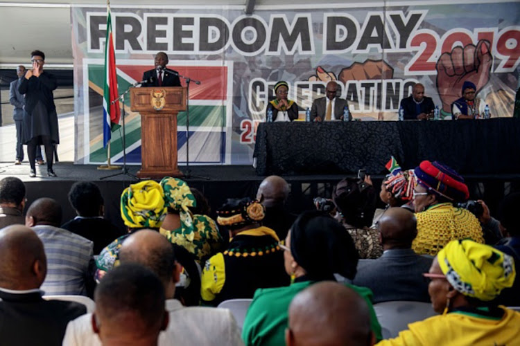 South African President Cyril Ramaphosa addresses the crowd gathered at the Miki Yili Stadium, ahead of the celebrations for the 25th anniversary of Freedom Day, in Makhanda, Eastern Cape Province on April 27, 2019.