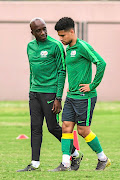 Coach David Notoane and Keagan Dolly during  Bafana training session at Sugar Ray Xulu Stadium  in Durban last week.