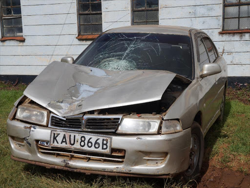 Mistubishi lancer at Lari police station that hit a 68 year old disabled woman leaving her grandson she was carrying admitted in hospital. /GEORGE MUGO