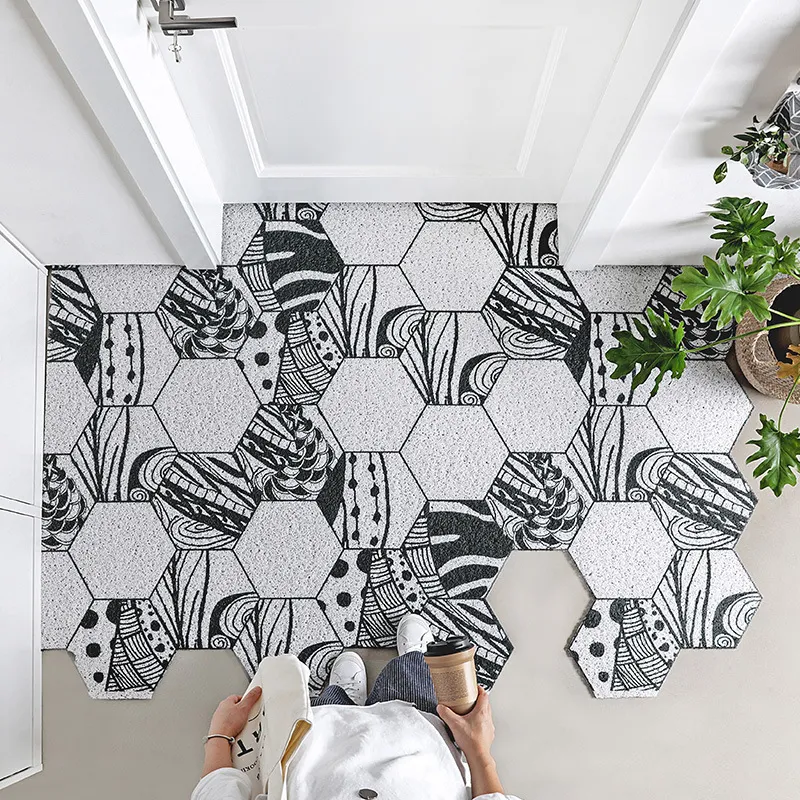 Tapete de porta de borracha resistente, antiderrapante e durável para uso interno e externo, fácil de limpar e ideal para proteção e boas-vindas.