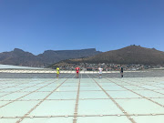 Some of the captains of the teams who are going to participate in the World Sevens Cape Town leg in South Africa posing for photo on top of the Cape Town Stadium, which is near world heritage site the Table Mountain. 