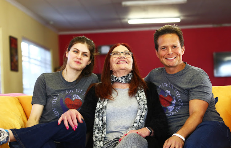 Hollywod actors and Elizabeth Taylor AIDS Foundation ambassadors Alexandra Daddario and Scott Wolf share a light moment with Gail Johnson the founder of Nkosi's Haven which looks after mothers and kids who are affected with HIV/AIDS.