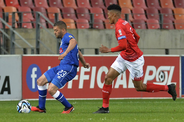 Grant Margeman of SuperSport United is challenged by Elmo Kambindu of Chippa United during the DStv Premiership match at Nelson Mandela Bay Stadium in Gqeberha on September 26, 2023