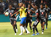 Orlando Pirates player Tapelo Xoki of Orlando Pirates celebrate his goal with his teammates during the DStv Premiership match against Mamelodi Sundowns at Loftus Versfeld Stadium on February 17, 2024.