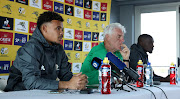 Bafana Bafana head coach Hugo Broos is flanked by captain Ronwen Williams (L) and vice-captain Siyanda Xulu (R) during a media briefing at Dobsonville Stadium. 