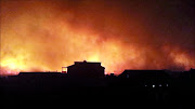 Flames threaten houses in Pringle Bay in the early hours of Thursday, January 3 2019.