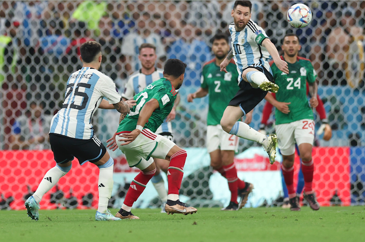 Lionel Messi of Argentina controls the ball during a 2022 Fifa World Cup Group C matchagainst Mexico at the Lusail Stadium in Lusail, Qatar on November 26