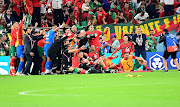  Players of Morocco celebrates after the victory over Portugal during the FIFA World Cup Qatar quarter final at Al Thumama Stadium on December 10, 2022 in Doha, Qatar to book a place in the semifinal. 