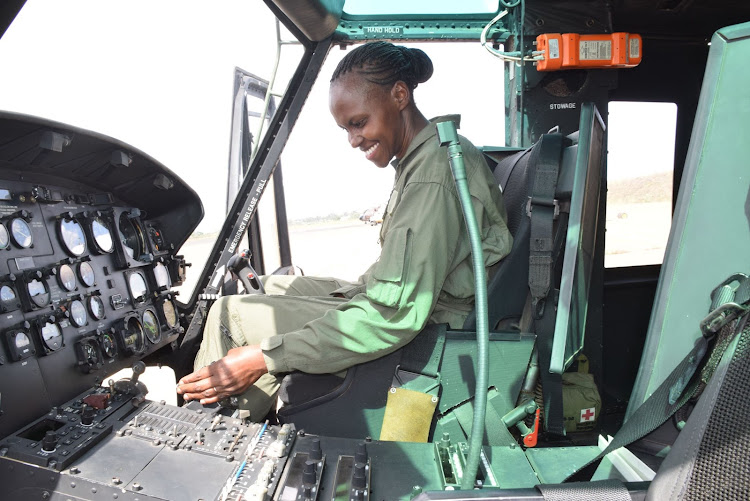 Senior sergeant Anne Mbaluka at work on one of the military aircrafts she services.