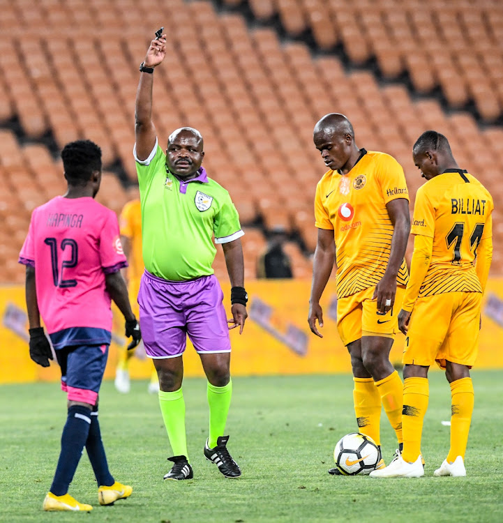 Referee Philip Tinyani hard at work during the Absa Premiership match between Kaizer Chiefs and Black Leopards at FNB Stadium.