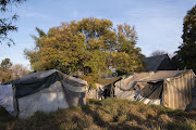 The tents at the Wembley Stadium shelter in which former residents of the Cape York building have been living since 2017.