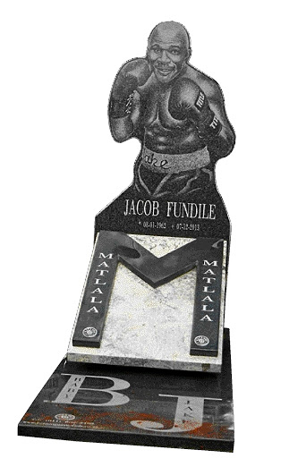 Baby Jake Matlala's grave at Westpark Cemetery is a life-size image of the boxer. / Mabuti Kali