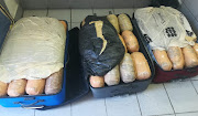 Police said compressed dagga was concealed in three travel bags. 