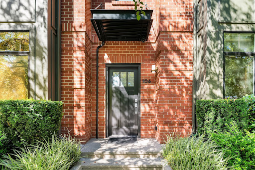 Brick house entrance with modern door in this luxury house for rent in Bellevue ($6,200)