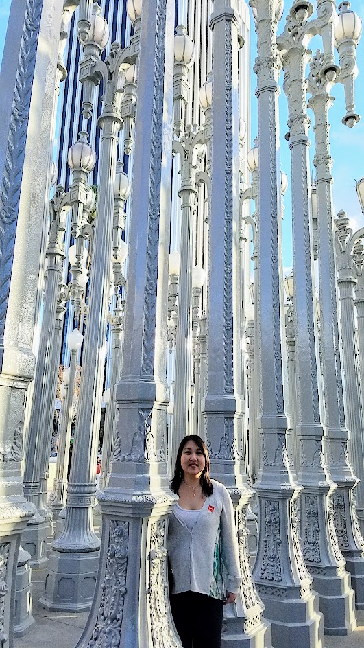 One of the most famous and free (since it is an outdoor sculpture) art you can see in the park at LACMA is the iconic Urban Lights. Created by Chris Burden, it is made of 202 restored street lamps in various styles based on where they were from (most are from southern California and some from Portland Oregon too!). The lamps are painted grey and assembled in a grid, and are solar powered and become lit in the evening.