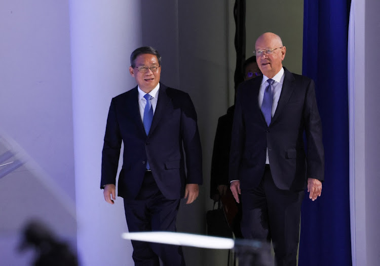 Klaus Schwab, founder World Economic Forum, and China's Premier Li Qiang attend the 54th WEF annual meetings in Davos, Switzerland, January 16 2024. Picture: DENIS BALIBOUSE/REUTERS