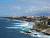 The beautiful coastline of San Juan as a cruise ship approaches Castillo de San Cristobal.