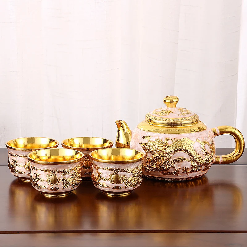 Service à thé chinois domestique rétro créatif avec théière, tasses et plateau. Savourez l'élégance et la tradition du thé à la maison.