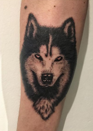 Dark Black Wolf Tattoo Design On Arm