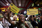 Delegates react to the announcement of the top seven at the 55th ANC national elective conference at Nasrec Expo Centre in Johannesburg on December 19 2022.