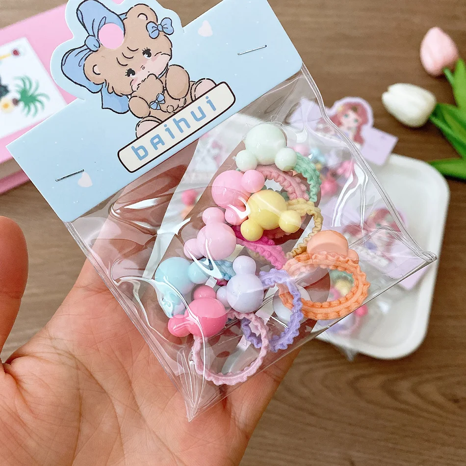 8 élastiques à cheveux colorés pour enfants, petits avec volants, parfaits pour les filles, doux et pratiques.
