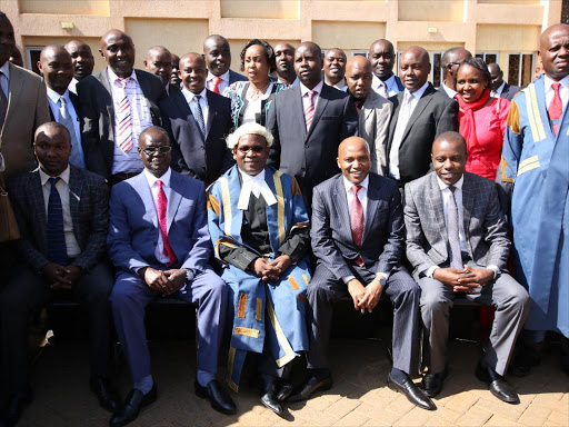 Meru Governor Kiraitu Murungi (2nd L) and Speaker Joseph Kaberia with MCAs last year