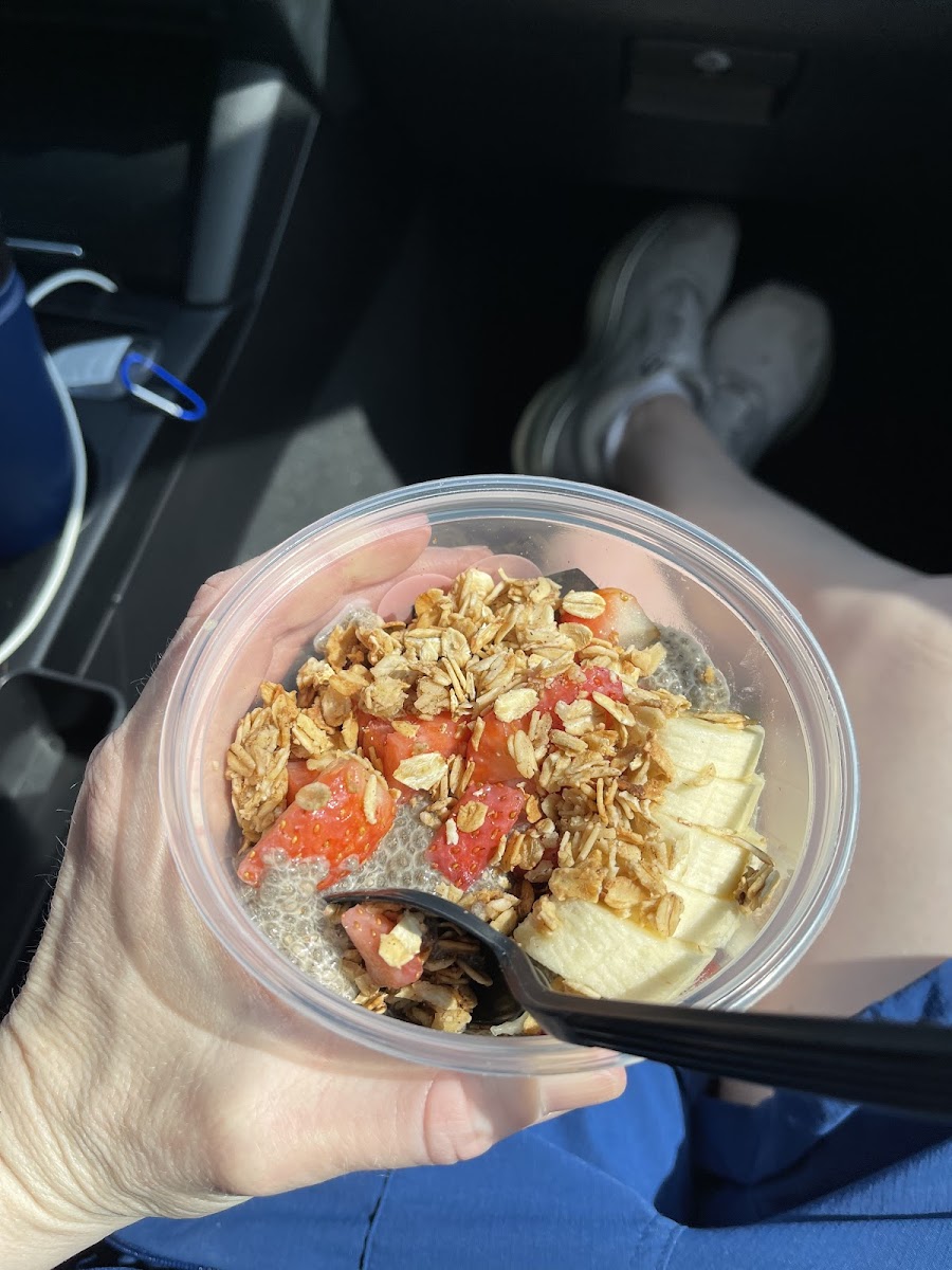 Chia pudding with banana, strawberries and topped with granola