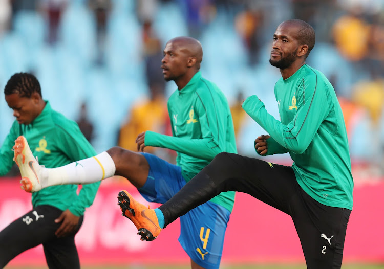 Newly signed Mamelodi Sundowns defender Mosa Lebusa (right) warms up with his teammates ahead of the club's season opening Absa Premiership match at home to Kaizer Chiefs at the Loftus Versveld Stadium, Pretoria on August 4 2018.