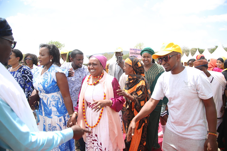 Marsabit county woman representative and National Assembly Deputy Majority Whip Naomi Waqo flanked by her supporters and leaders at an event where she was blessed by elders in Moyale, Friday, February 16, 2024.