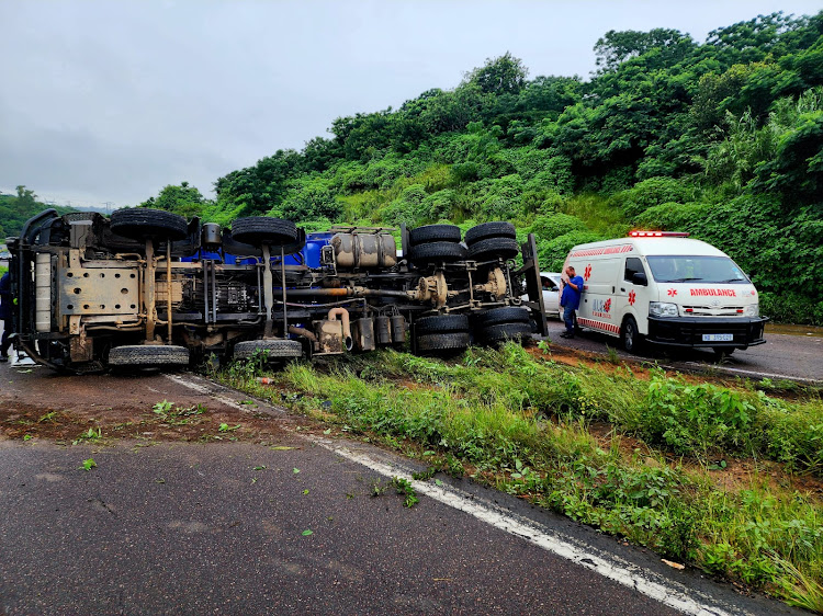 A truck overturned after a collision with a car on the M7 in Durban on Wednesday. A secondary accident followed when another truck crashed into the first collision site, resulting in a fatality.