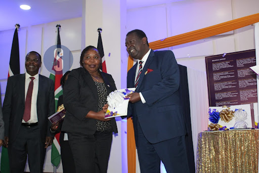 Presiding judge anti-corruption and economic crime division Justice Esther Maina receives a copy of the report during the launch of the EACC 2023-2028 strategic plan at KICC, Nairobi on September 26, 2023.