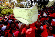 Members of the South African Democratic Teachers Union during a march on April 24, 2013 in Pretoria, South Africa. The teachers are demanding the Minister of Basic Education, Angie Motshekga and the department's director-general Booby Soobrayan to resign.