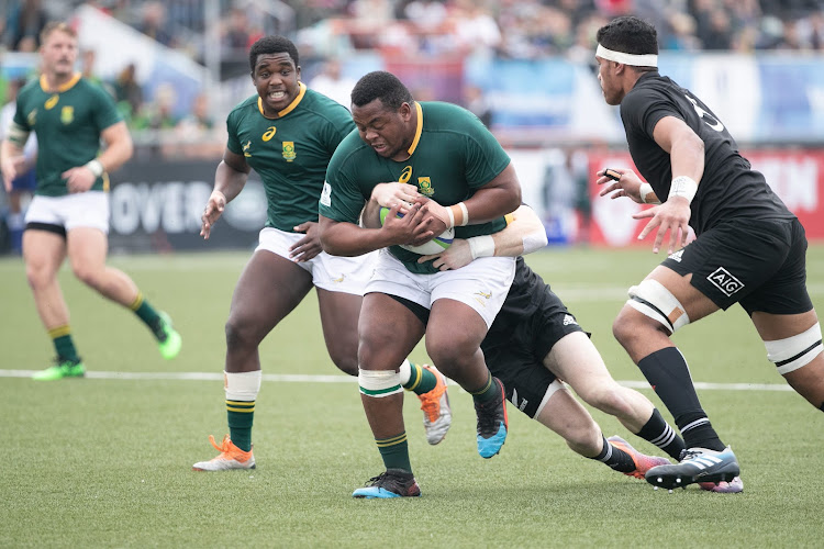 Asenthani Ntlabakanye from South africa runs with the ball during the World Rugby U20 Championship match between South Africa and New Zealand at Racecourse Stadium on June 021, 2019 in Rosario, Argentina