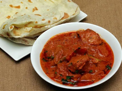 Tawa Chicken (2Pc) + 1 Butter Naan