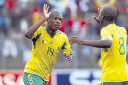 ACE IN THE BABY BAFANA PACK: Baby Bafana striker Phumelelo Bhengu celebrates scoring a goal with a teammate in this file picture. Bhengu scored for SA against Ivory Coast on Sunday. Photo: VELI NHLAPO.