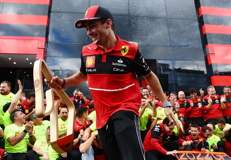 Race winner Charles Leclerc of Monaco and Ferrari celebrates with his team after the F1 Grand Prix of Austria at Red Bull Ring in Spielberg, Austria, July 10 2022. Picture: CLIVE ROSE/GETTY IMAGES