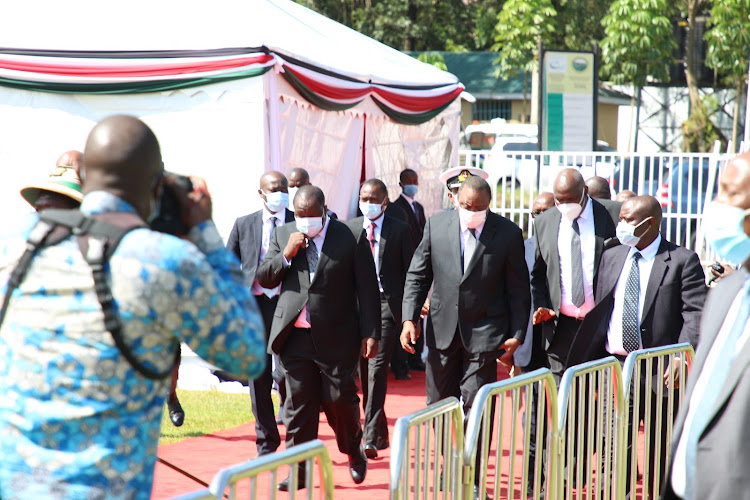 President Uhuru Kenyatta arrives at Gusii Stadium for the burial service of Simeon Nyachae