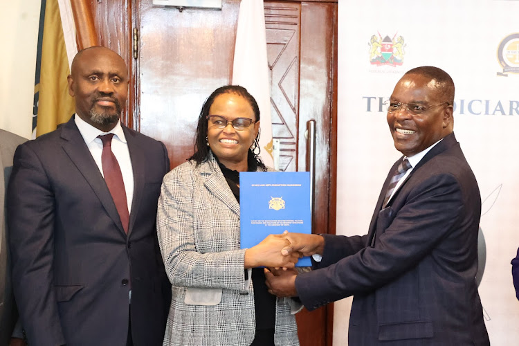 Chief Justice Martha Koome receiving Judiciary audit reports from EACC chairperson Bishop David Oginde on May 10, 2023.