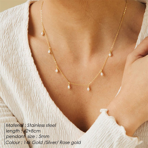 Title 5, Oval Pearl Tassel Necklace a stylish accessory ...