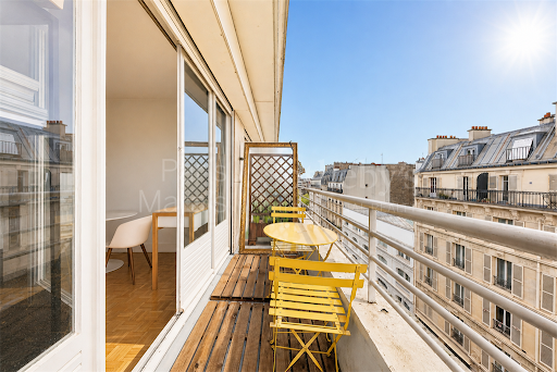 Apartment / penthouse purchase in Paris 12ème (75012) - Balcony with yellow table and chairs