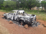 One of the torched vehicles.