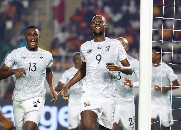 Evidence Makgopa celebrates scoring Bafana Bafana's first goal against Morocco with teammates.