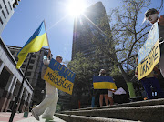 A group of Ukrainian citizens protest outside the Russian embassy in Cape Town on February 25 2022. They are calling for a stop to Russia's incursion into Ukraine. 