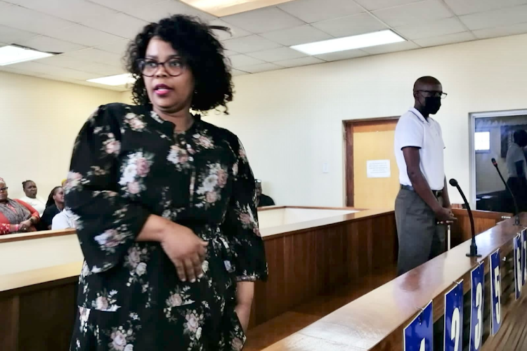 Nongcebo Faith Ntombela, wife of murdered Umlazi police officer Capt Thomas Ntombela, in the dock with school principal Sthembiso Khumalo during their bail application.