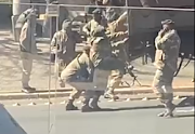 A video of the soldier being helped into a truck has been shared online.