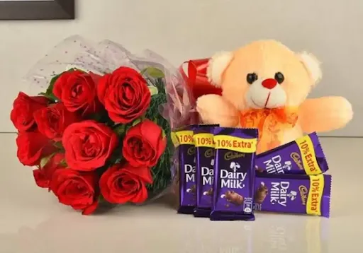 1 Teddy Bear With 10 Red Rose Bunch And 5 Dairy Milk