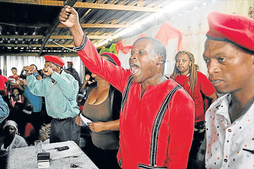 COURT CHALLENGE: Eastern Cape EFF leader Themba Wele, centre, at a meeting in Orange Grove Picture: MICHAEL PINYANA