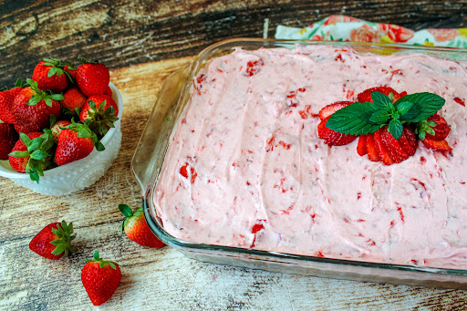 Moist Strawberry Cake ready to be sliced.