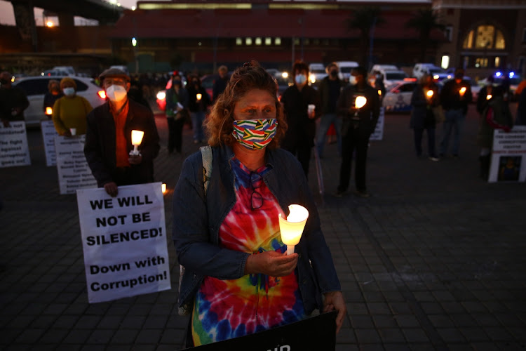 A vigil for Babita Deokaran at Mary Fitzgerald Square in Newtown, Johannesburg, on August 26. Deokaran, a former official in the Gauteng health department, was shot dead on August 23 outside her home after reporting corruption in the procurement of R332m of PPE. File photo.